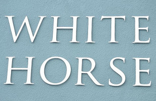 The White Horse Baston logo