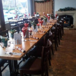 The Olive Branch Dentro