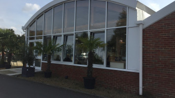 The Olive Tree Cafe And outside